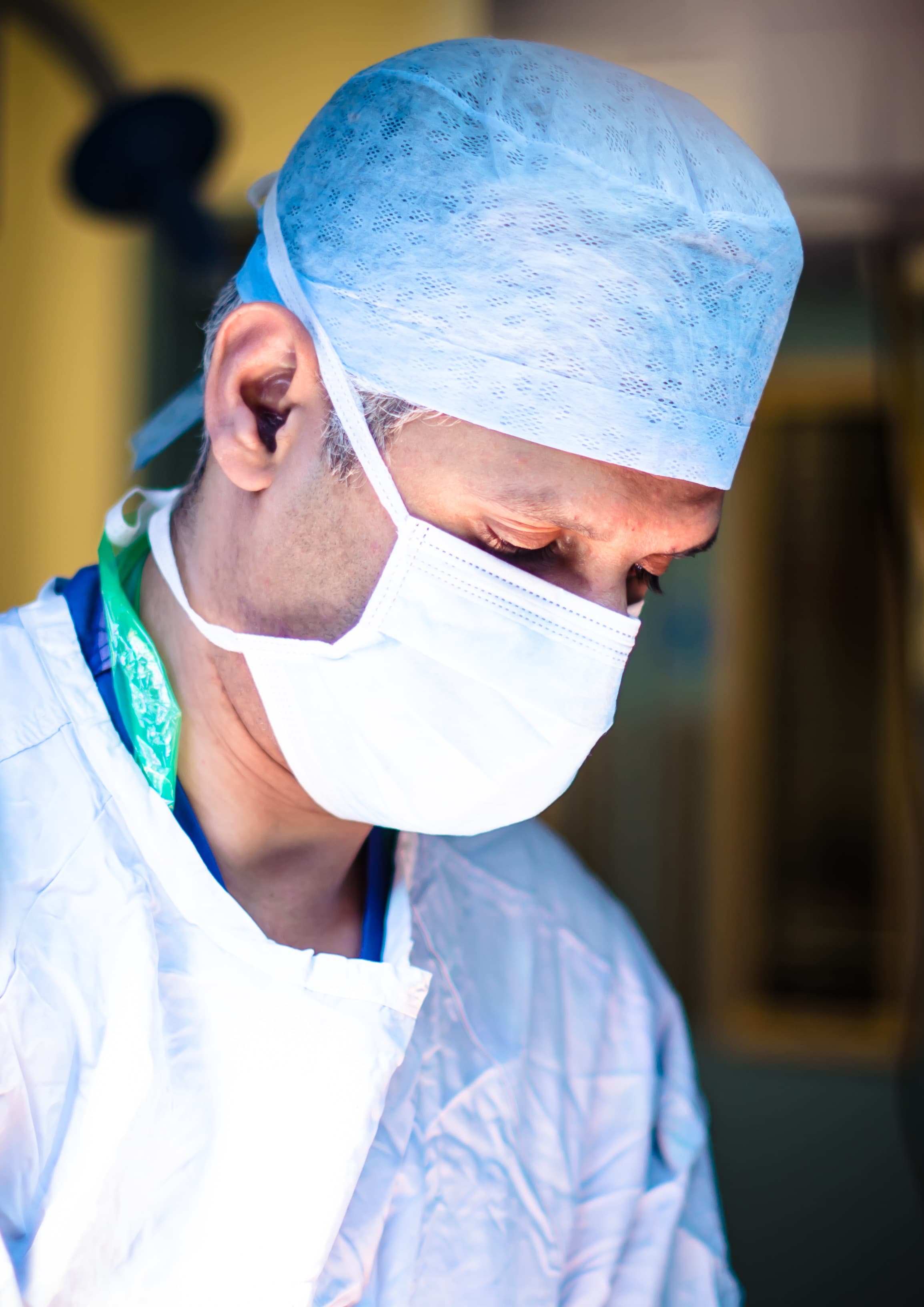 Professor Tas Qureshi in a clinical setting.